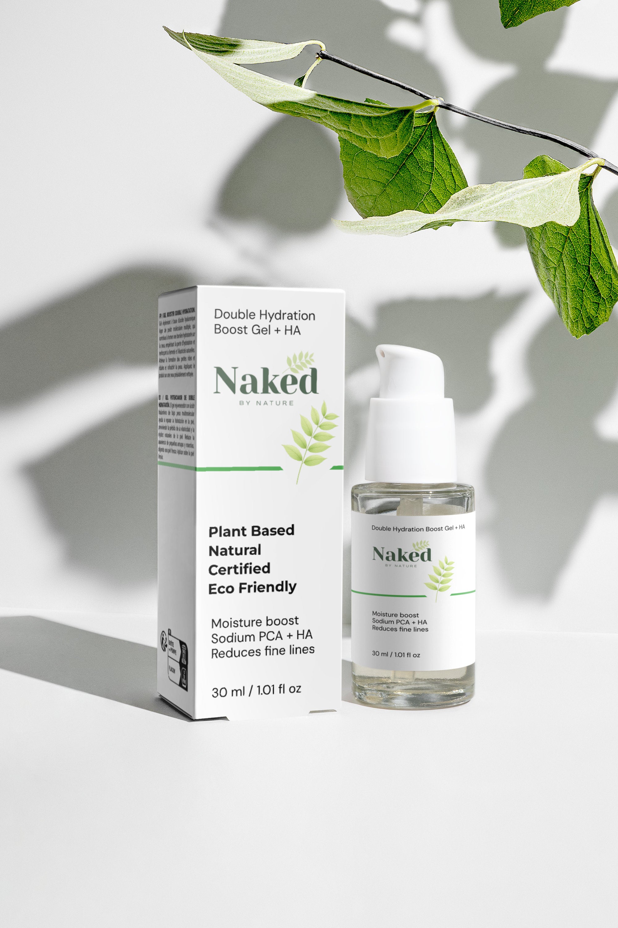Plant-based hydration gel with Sodium PCA + HA, eco-friendly skincare in clear bottle and box, fresh green leaves overhead